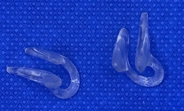 HelixForm clips on a blue surgical drape